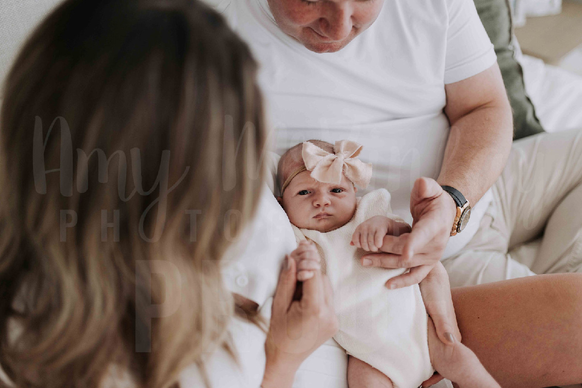 Newborn baby Layla Rose Johnson smilin